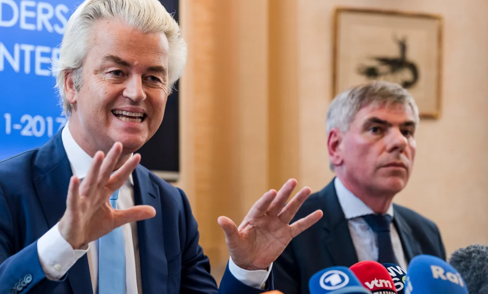 Dutch far-right leader Geert Wilders, left, and Belgian anti-immigrant politician Filip Dewinter address the media at the Belgian federal parliament in Brussels on Friday, Nov. 3, 2017. A Belgian mayor banned Wilders and Dewinter from holding a rally in Molenbeek, a Muslim-majority Brussels neighborhood. (AP Photo/Geert Vanden Wijngaert)