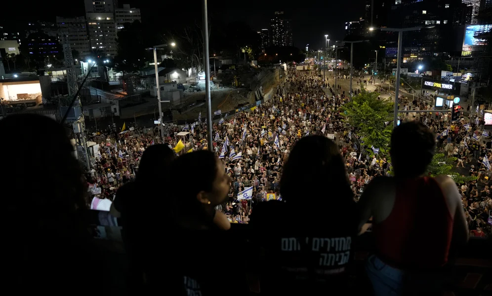 Relatives of hostages held by Hamas in the Gaza Strip and their supporters call for the immediate release of hostages held by the militant group, and protest against Israeli Prime Minister Benjamin Netanyahu's government in Tel Aviv, Israel, Saturday, Aug. 10, 2024. (AP Photo/Mahmoud Illean)