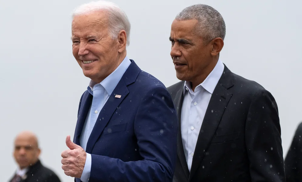 President Joe Biden, left, and former President Barack Obama arrive at John F. Kennedy International Airport, Thursday, March 28, 2024, in New York. (AP Photo/Alex Brandon)