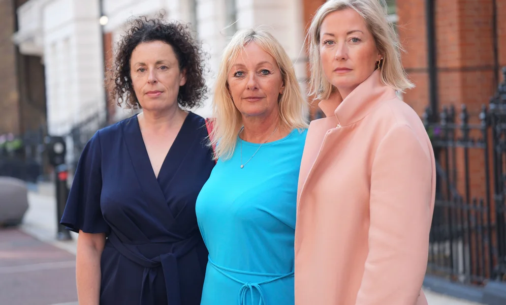 Three of Mr Al Fayed's accusers, left to right, Katherine (no surname given), Lindsay Mason and Gemma (no surname given), pose for a photograph after a press conference about the investigation and the legal claim against Harrods for failing to provide a safe system of work for their employees, at Kent House in Knightsbridge, London, Friday Sept. 20, 2024. (Yui Mok/PA via AP)