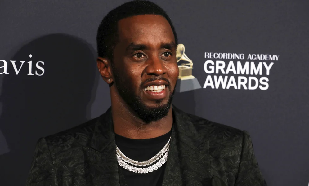 FILE - Sean Combs arrives at the Pre-Grammy Gala And Salute To Industry Icons at the Beverly Hilton Hotel on Saturday, Jan. 25, 2020, in Beverly Hills, Calif. A woman who says Combs subjected her to violence and abuse over several years in the 1990s has filed a lawsuit in New York, Thursday, May 23, 2024, accusing the rapper of sexual assault, battery and gender-motivated violence. (Photo by Mark Von Holden/Invision/AP, File)