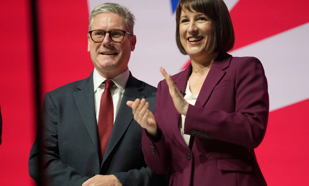 Britain's Prime Minister Keir Starmer and Chancellor of the Exchequer Rachel Reeves attend the Labour Party Conference in Liverpool, England, Monday, Sept. 23, 2024.(AP Photo/Jon Super)
