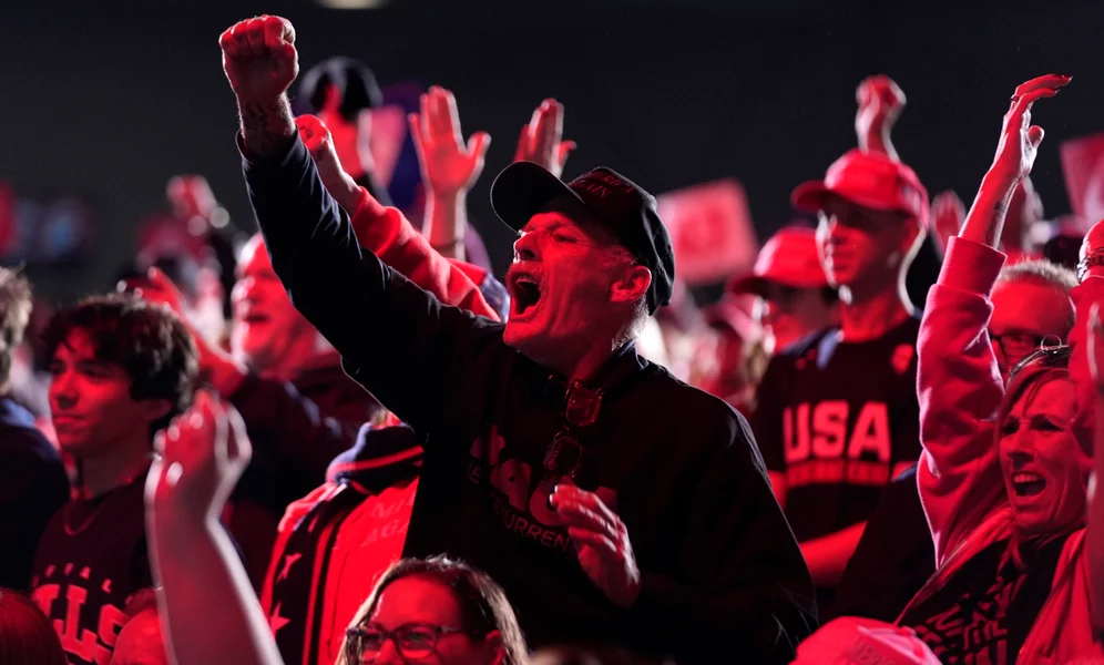 Attendees cheer as Republican presidential nominee former President Donald Trump speaks during a campaign rally at the Suburban Collection Showplace, Saturday, Oct. 26, 2024, in Novi, Mich. (AP Photo/Alex Brandon)
