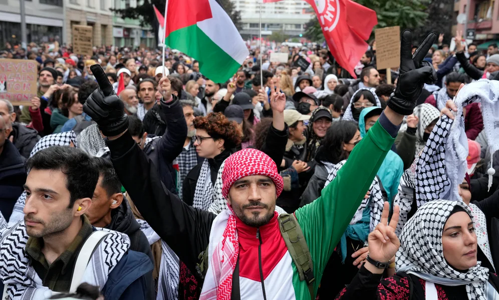 Thousands of people take part in a pro-Palestinian rally in Berlin, Germany, Sunday, Oct. 6, 2024. (AP Photo/ Ebrahim Noroozi)